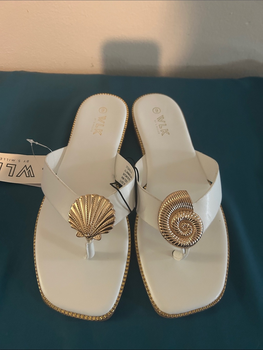 White Leather Shell-Embellished Toe-Post Sandals with Gold Accents
